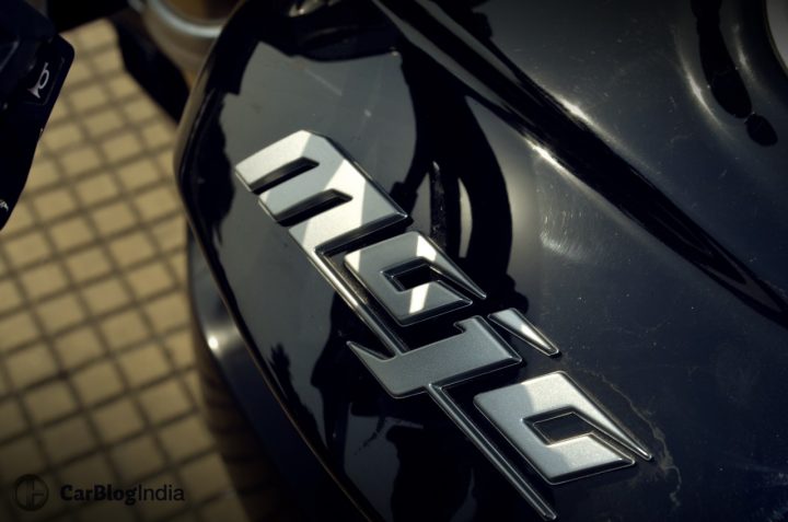 Mahindra mojo 300 review logo