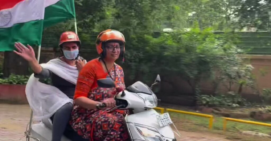 Smriti Irani Taking Scooter to Work