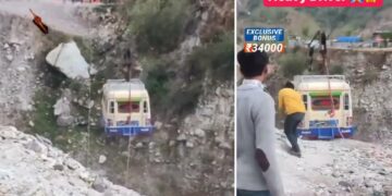 Force Traveller Attached to Wire Across River in Nepal