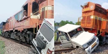 Mahindra Bolero Hit by Train at Crossing