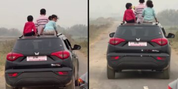 3 Children Standing out of Sunroof of Mahindra XUV300