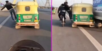 Man Hanging Out of Auto Rickshaw Hits Cyclist