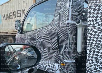 New Mahindra Mini-truck spied on test side profile front door