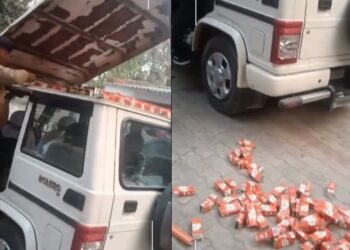 Smugglers Transport 800 Liquor Bottles in Mahindra Bolero Roof