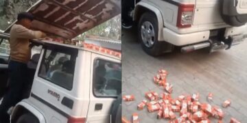 Smugglers Transport 800 Liquor Bottles in Mahindra Bolero Roof