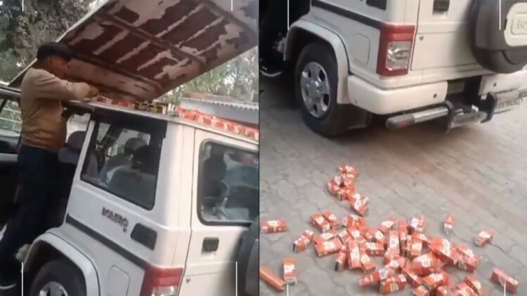 Smugglers Transport 800 Liquor Bottles in Mahindra Bolero Roof