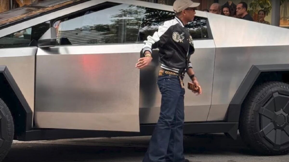 Pharrell Williams with Her Tesla Cybertruck